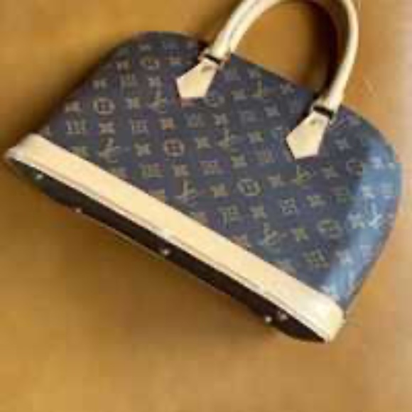 Elegant tan leather fun bag - Picture 2 of 10